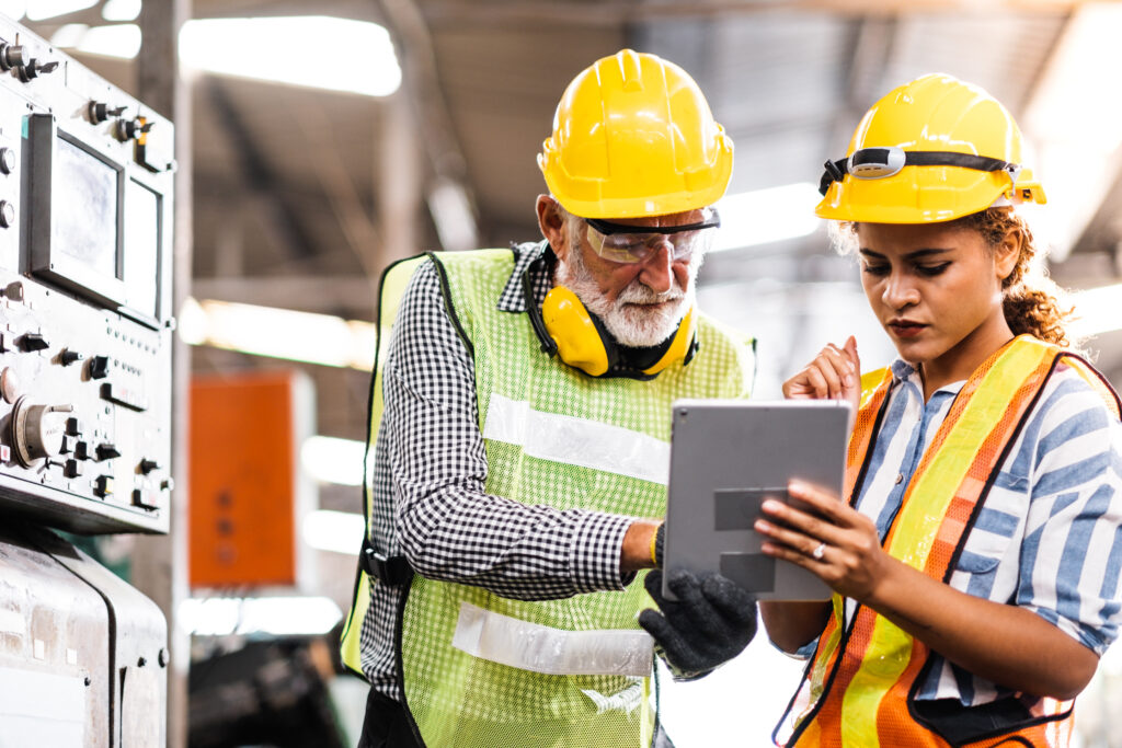 Industrial Engineers in Hard Hats.Work at the Heavy Industry Man